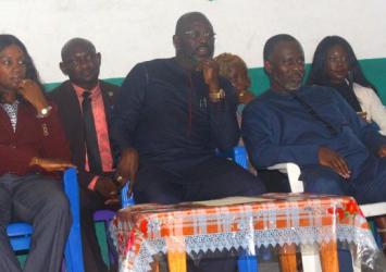 First Lady Clar M. Weah, President Weah and Minister of State Nathaniel McGill seated at the Program.EXECUTIVE MANSION