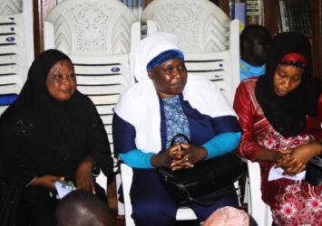 Makenneh Keita from the Office of the President seated in the middle and others at the Gurley Street Mosque during the donation.EXECUTIVE MANSION