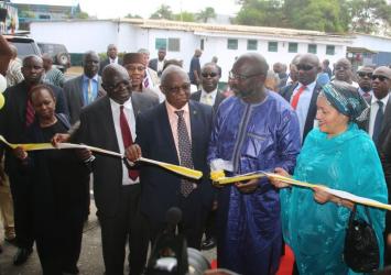 Pres Weah and DEP SG Mohammed cutting the ribbon at the building of  new ECOWAS RadioExecutive Mansion Photo