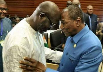 President Alpha Conde, outgoing Chair of the AU welcomes President Weah on his first African Union appearance.Executive Mansion Photo