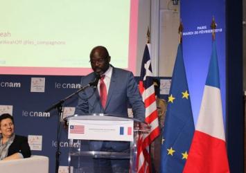 President George Manneh Weah addresses the audience at Conservatoire National Arts at Metiers in Paris FranceExecutive Mansion Photo