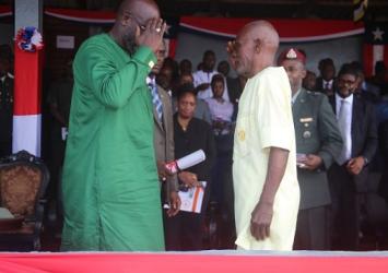 President Weah Salutes Col. Thomas T. Freeman (Rtd) of the Armed Forces of Liberia Executive Mansion Photo