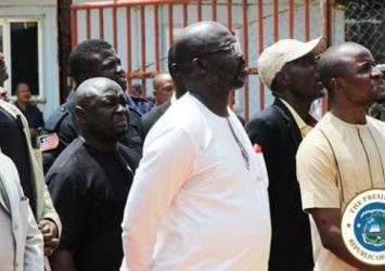 President Weah and MOJ Correction Minister Eddie Trawally along with other officials looking at inmates at the MCPExecutive Mansion
