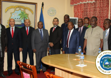 President Weah and other Government Officials pose with the Sime Darby Plantation Delegation.pngExecutive Mansion