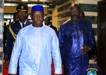 President Weah escorts his Sierra Leonean counterpart at his Foreign Affairs office.EXECUTIVE MANSION