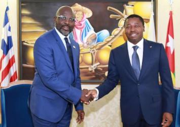 President Weah in a Handshake with his Togolese Counterpart, Faure Gnassingbe.EXECUTIVE MANSION