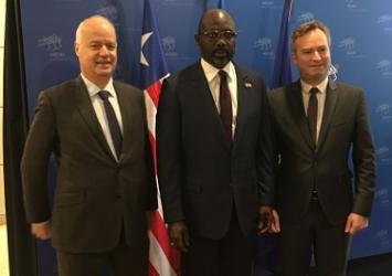 President Weah in a group photo with Executives of Movement des enterprise de France during official visit to FranceExecutive Mansion Photo