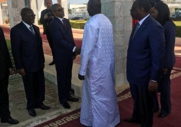 President Weah greets members of the Senegalese government on arrival in SenegalExecutive Mansion Photo