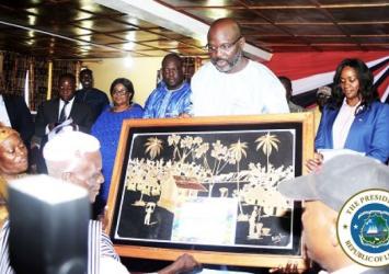 President Weah receives gift from Traditional Leaders at the Peace Park naming ceremony in BentolEXECUTIVE MANSION