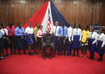 Students Pose with President Weah Following the Meeting.EXECUTIVE MANSION