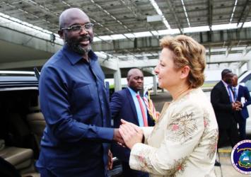 US Ambassador Christine Elder greets President Weah at the US 242nd Independence Ceremony in Monrovia EXECUTIVE MANSION